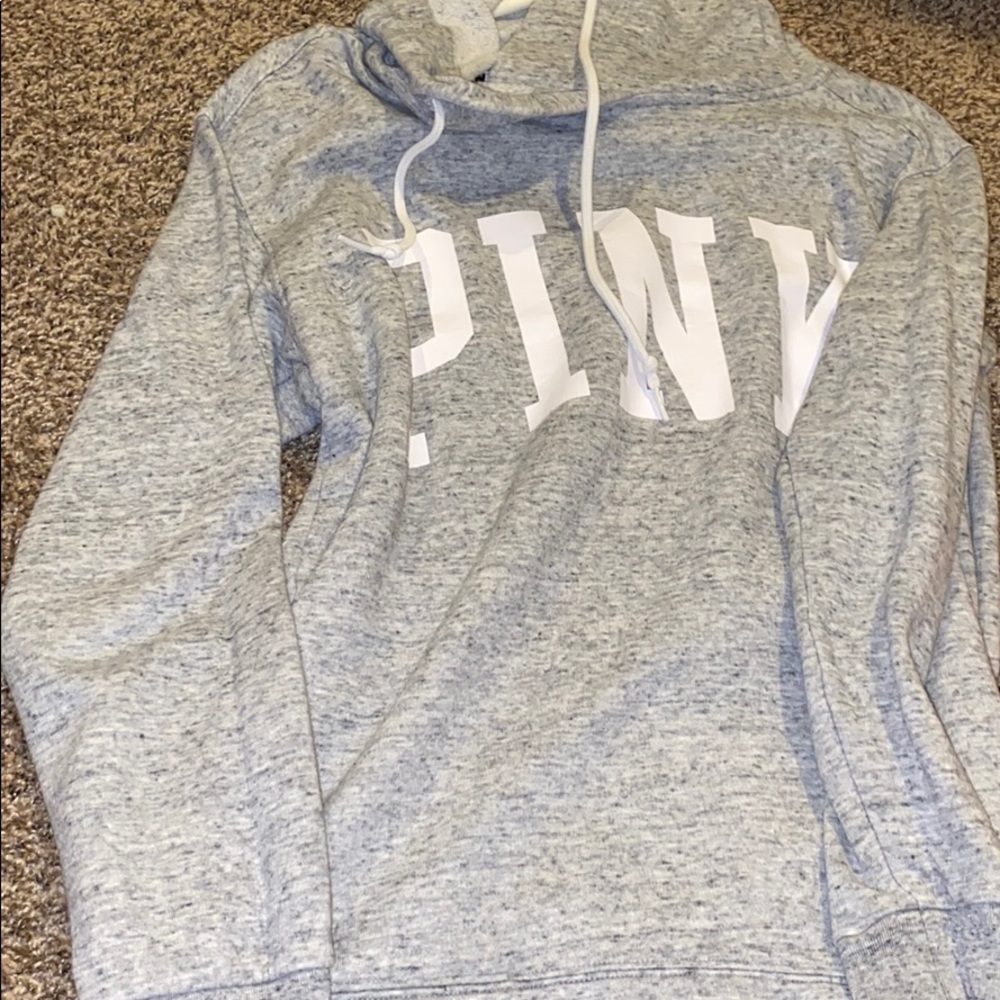 Pink hoodie with white words